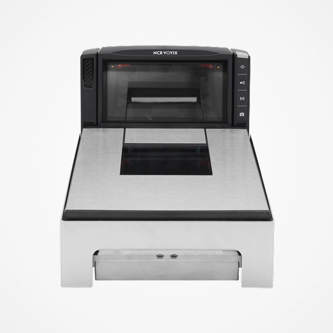 Front view of NCR Voyix bioptic scanner with stainless steel surface and control buttons on the right.
