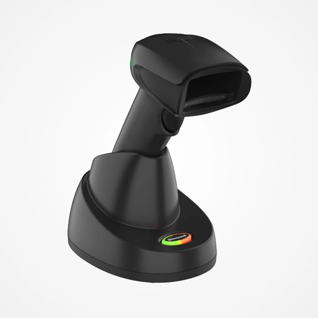 Black wireless barcode scanner on its charging base with a colored indicator light.