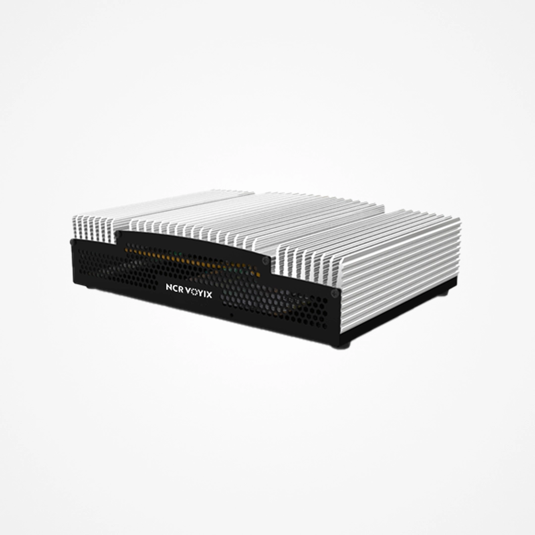Compact NCR Voyix hardware POS specialized server with a ribbed silver top and black base.