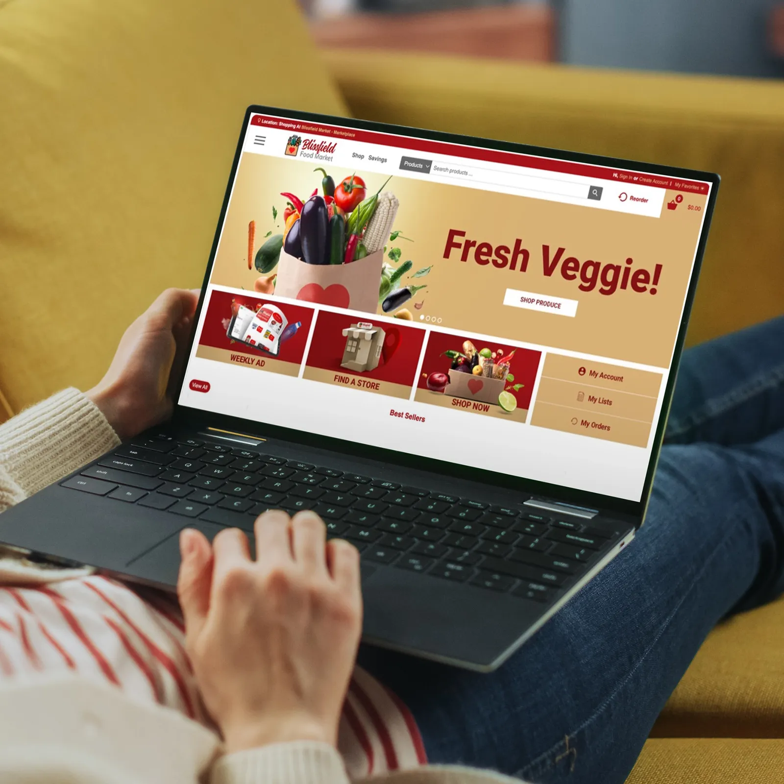 Person shopping online for fresh vegetables on a laptop with a grocery store website open.