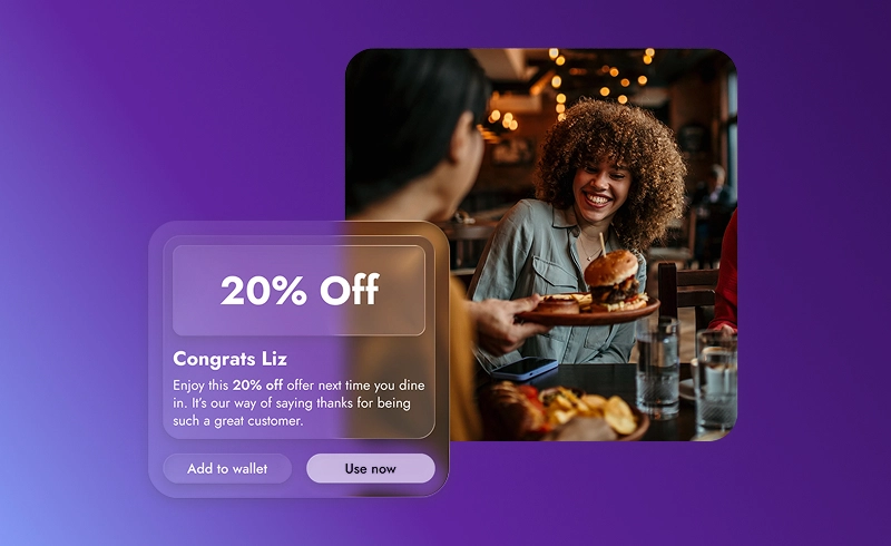 Woman smiling and receiving a burger at a restaurant with a 20% off dining offer message.