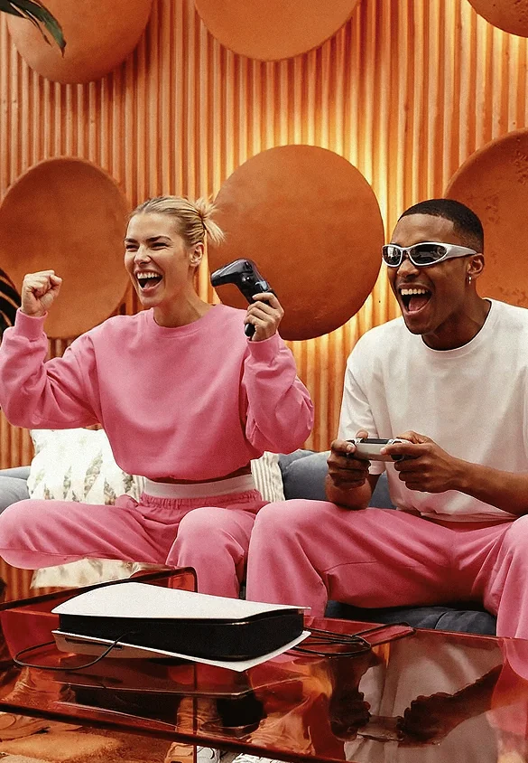 friends playing in game room