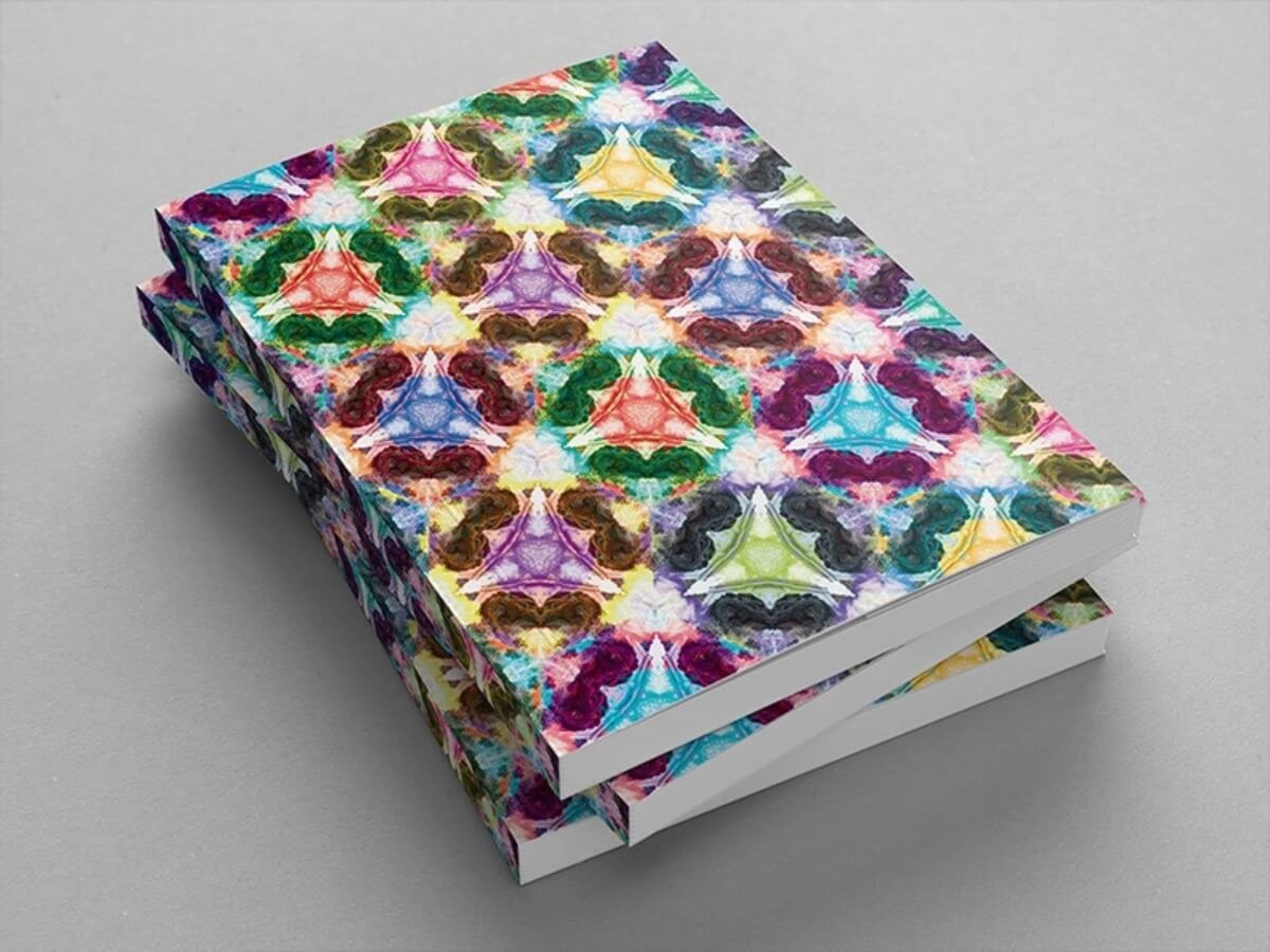 NSCAD University graduation catalogue cover with a kaleidoscopic pattern