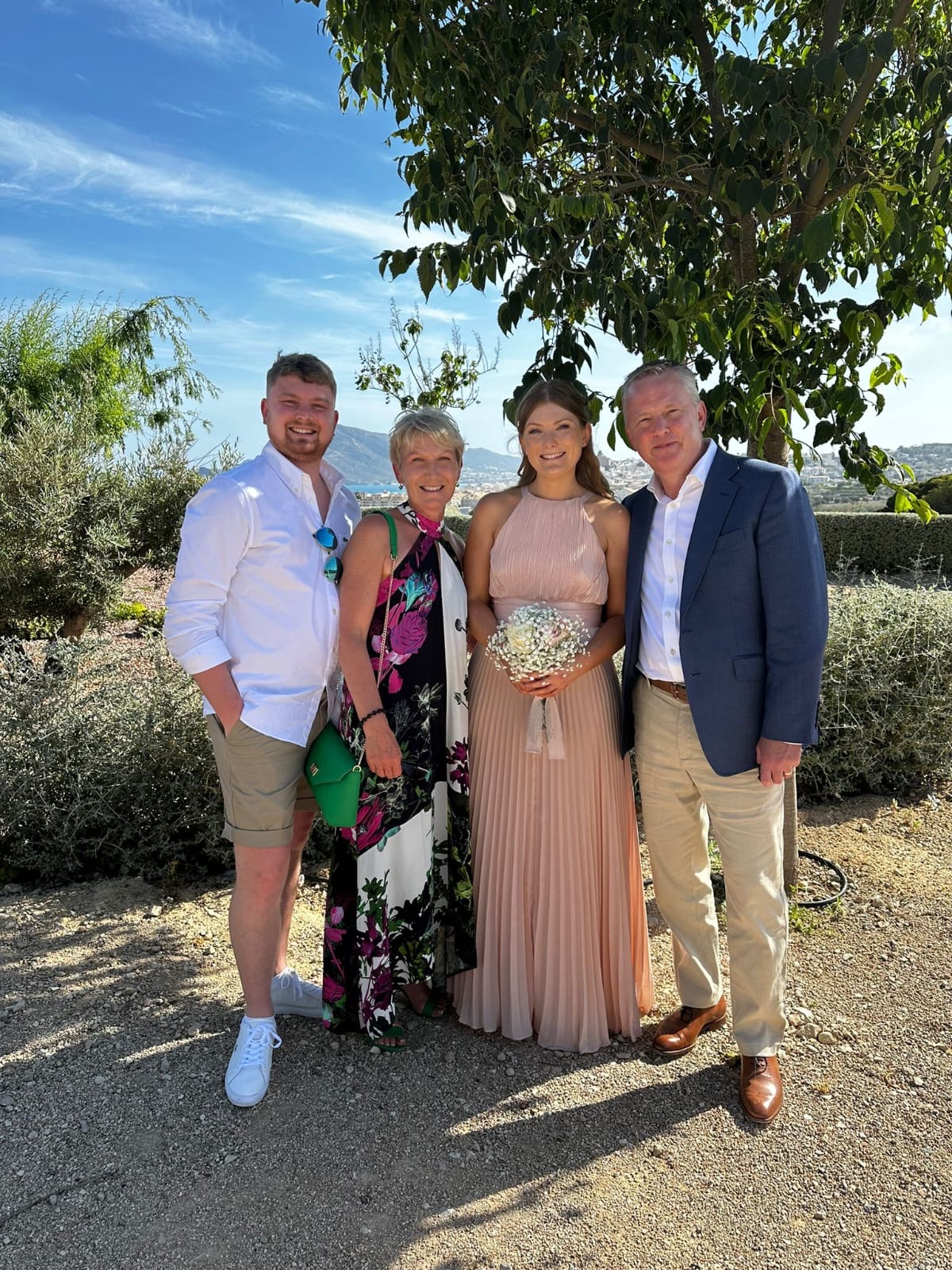 Amy stood with her family