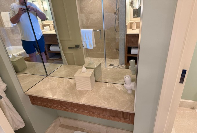 Powder table with three-sided mirror in the bathroom at Four Seasons Resort Palm Beach