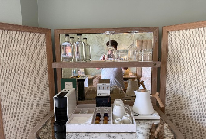 In-room tea and coffee making station at Four Seasons Resort Palm Beach with kettle, cups and supplies