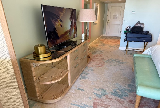 Four Seasons Palm Beach guest room featuring a large flat-screen television and contemporary coastal décor