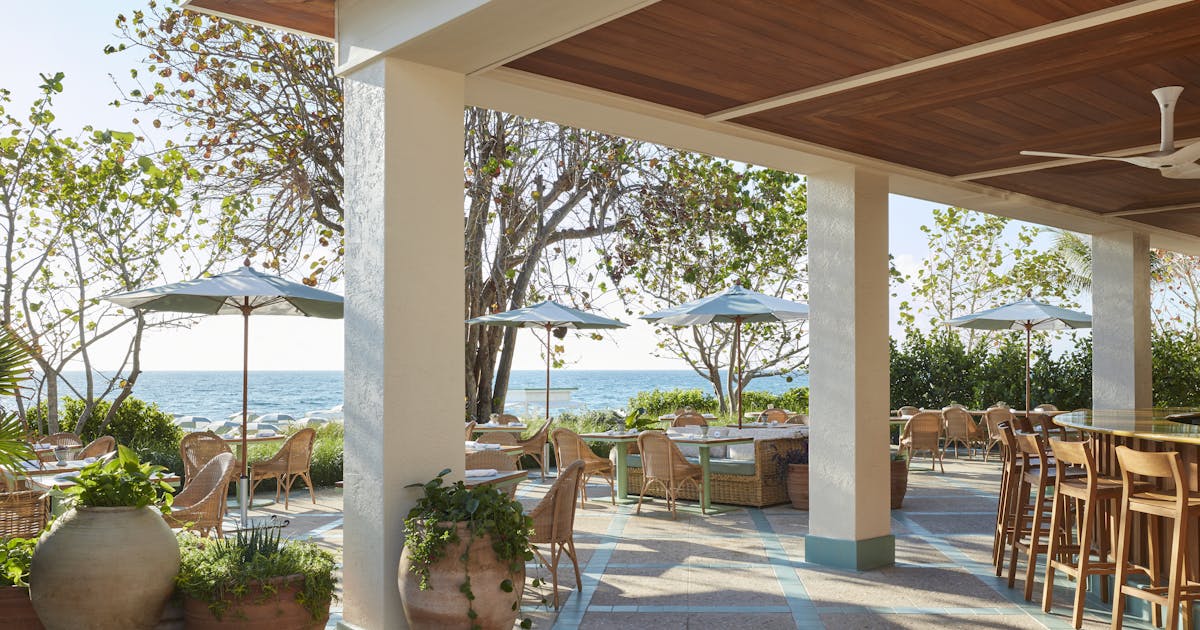 Seaway restaurant at Four Seasons Resort Palm Beach with oceanfront seating and tropical surroundings