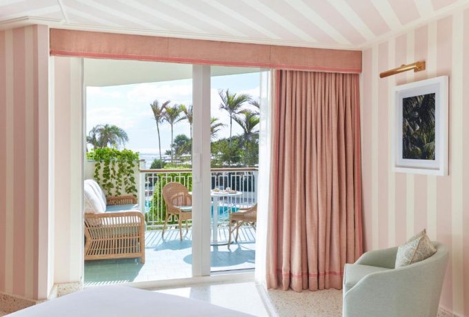 Pastel-coloured guest room at Four Seasons Resort Palm Beach full of character and natural light