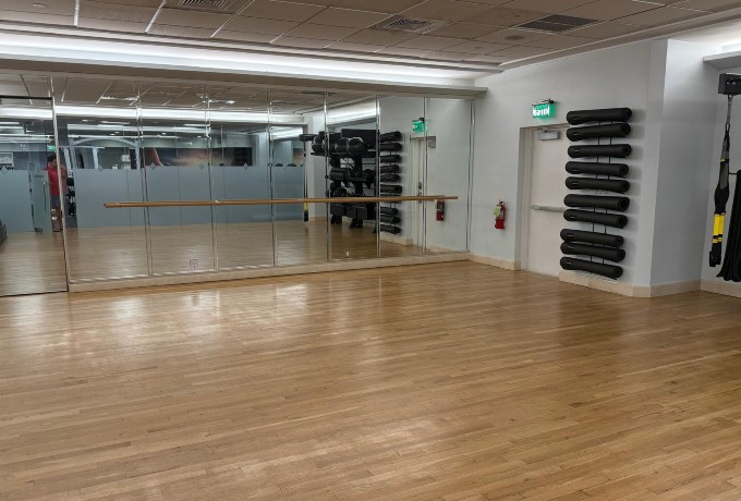 Fitness studio at Four Seasons Palm Beach equipped for group classes and stretching