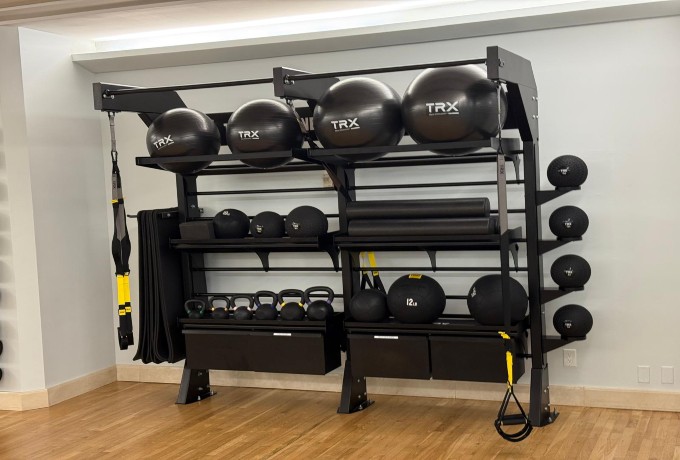Cardio equipment inside the gym at Four Seasons Palm Beach including treadmills and bikes