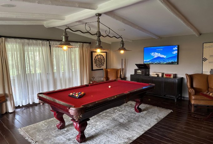 Billards in the library at One & Only Gorillas Nest