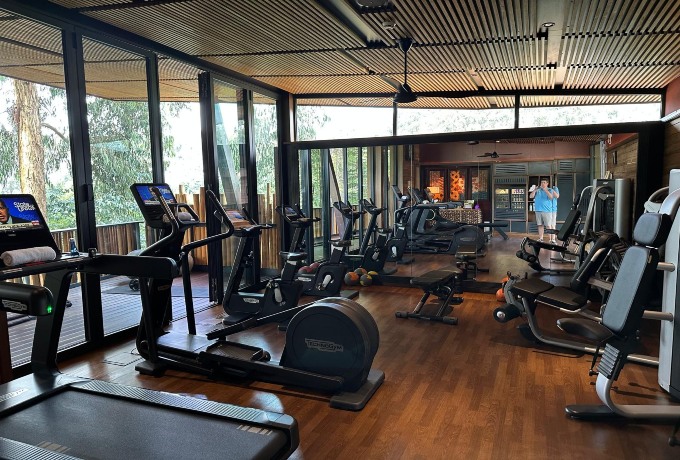 Gym with forest views at One & Only Gorillas Nest.