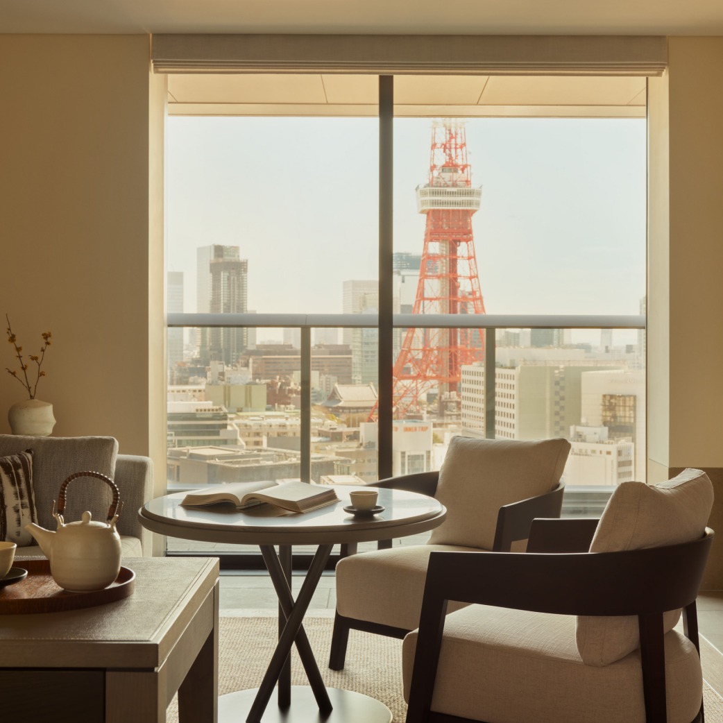 Janu Tokyo suite with Tokyo Tower view from a luxury hotel room.