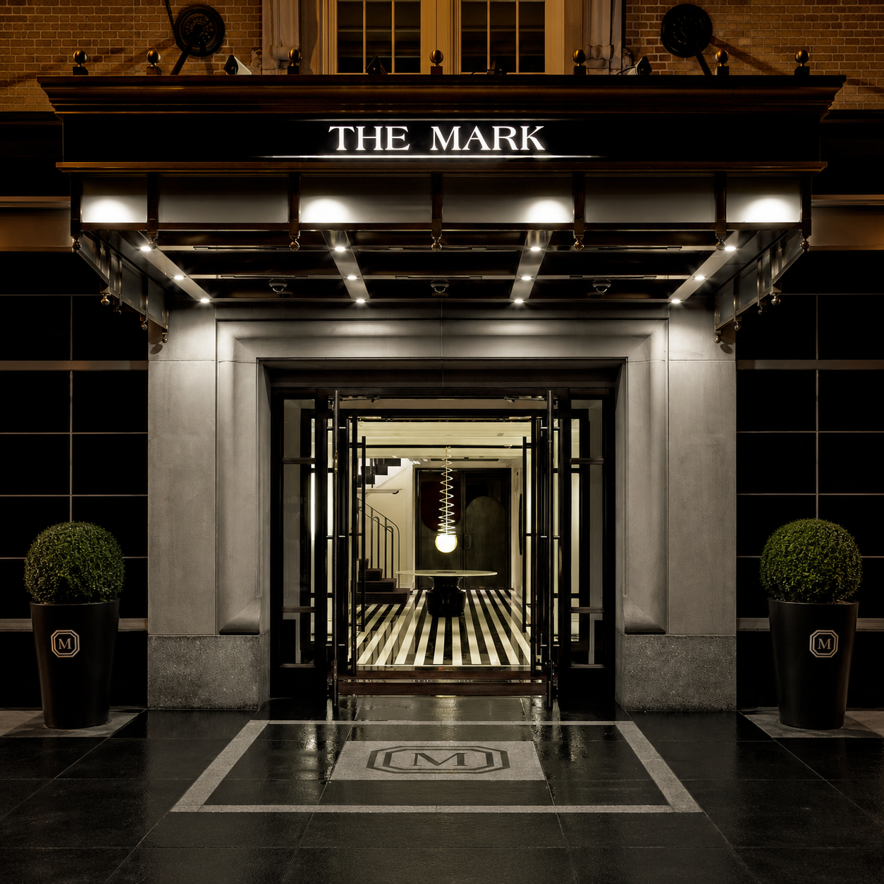 Entrance to The Mark hotel in New York, an eligible Preferred Hotels Platinum Partner property with upgrade benefits through Clements Travel.