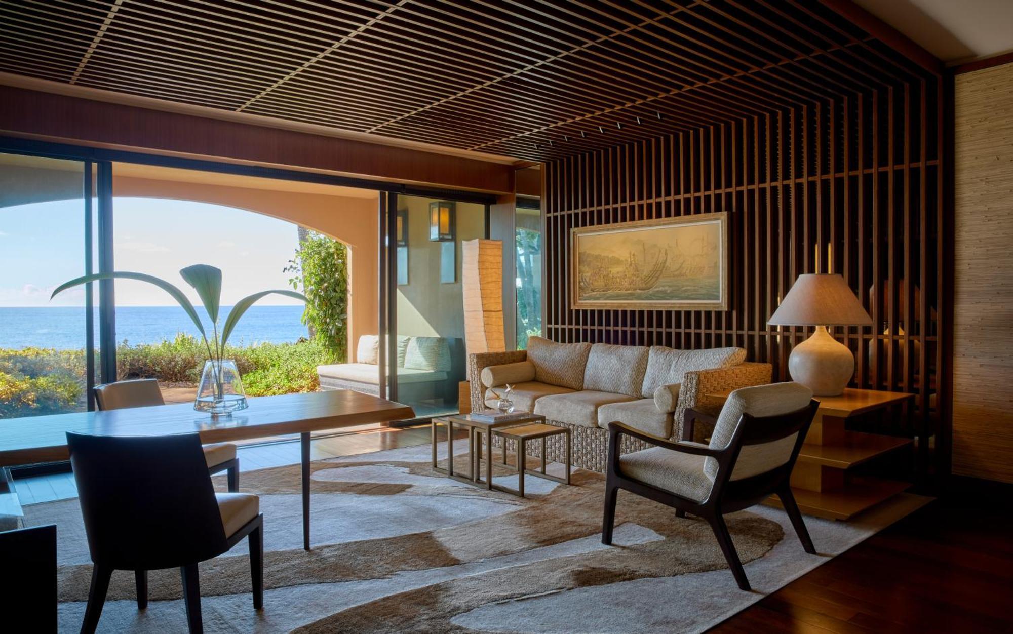 Four Seasons Resort Lanai beachfront pool, featured in the guaranteed upgrade offer at Clements Travel.
