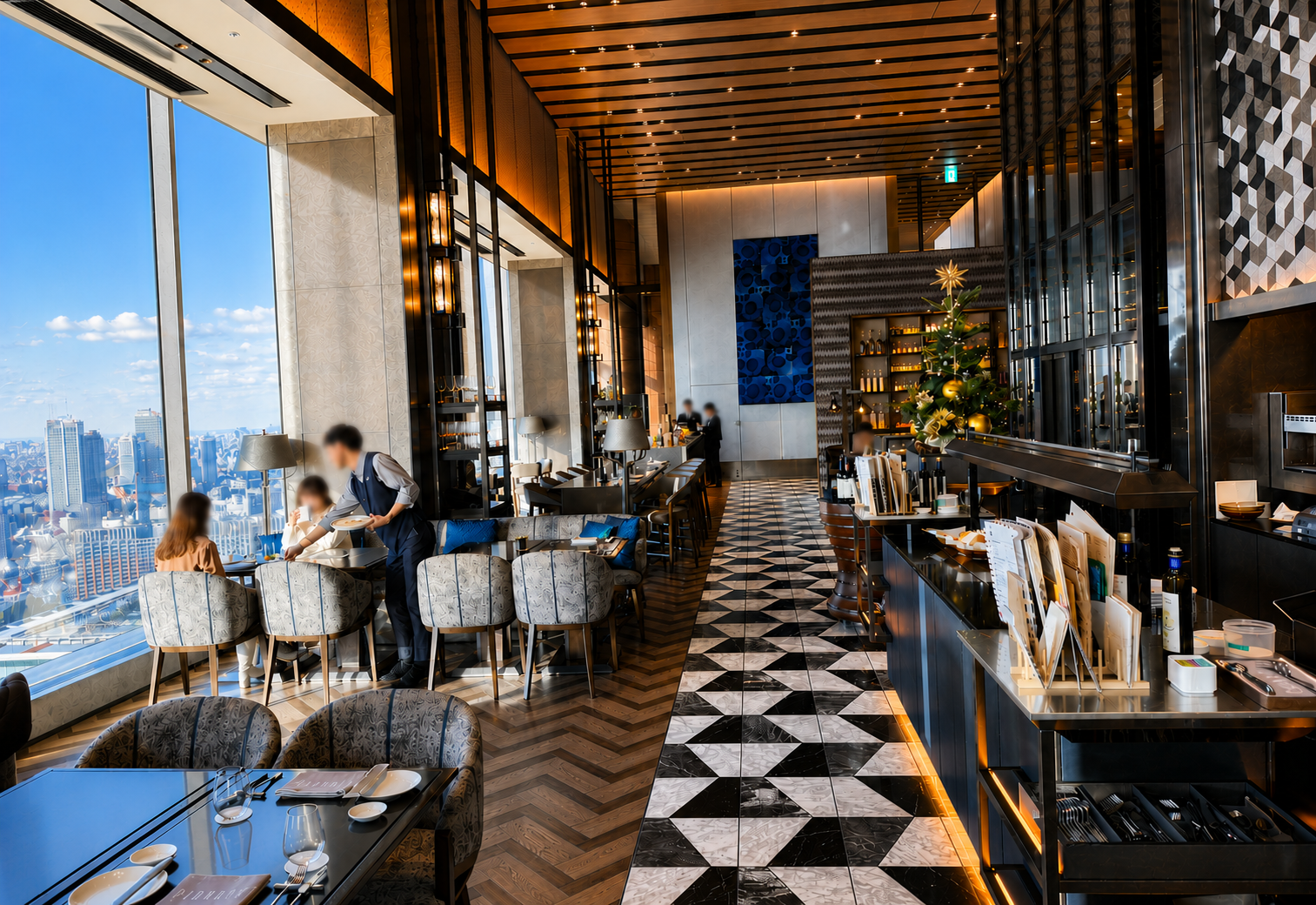Pigneto restaurant at Four Seasons Hotel Tokyo at Otemachi with floor-to-ceiling windows and panoramic Tokyo views.
