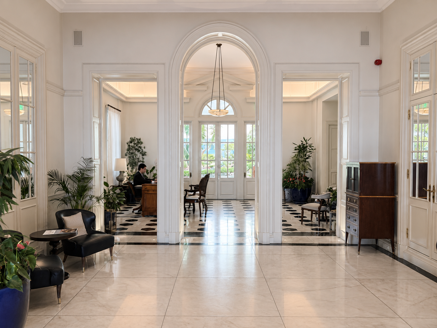 Centered archway and marble lobby of Belmond Reid’s Palace in Madeira.