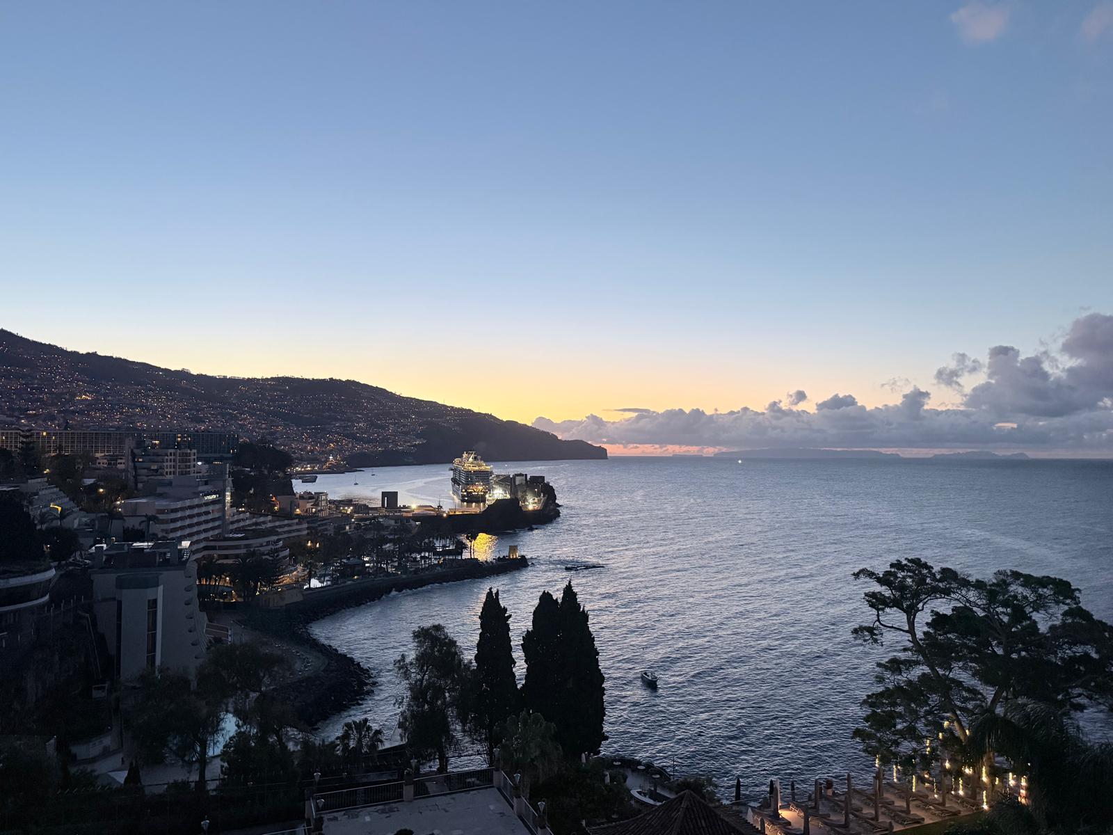 Sunset view over Funchal Bay and the cruise port from our Junior Suite in the newer wing of Belmond Reid’s Palace Madeira.