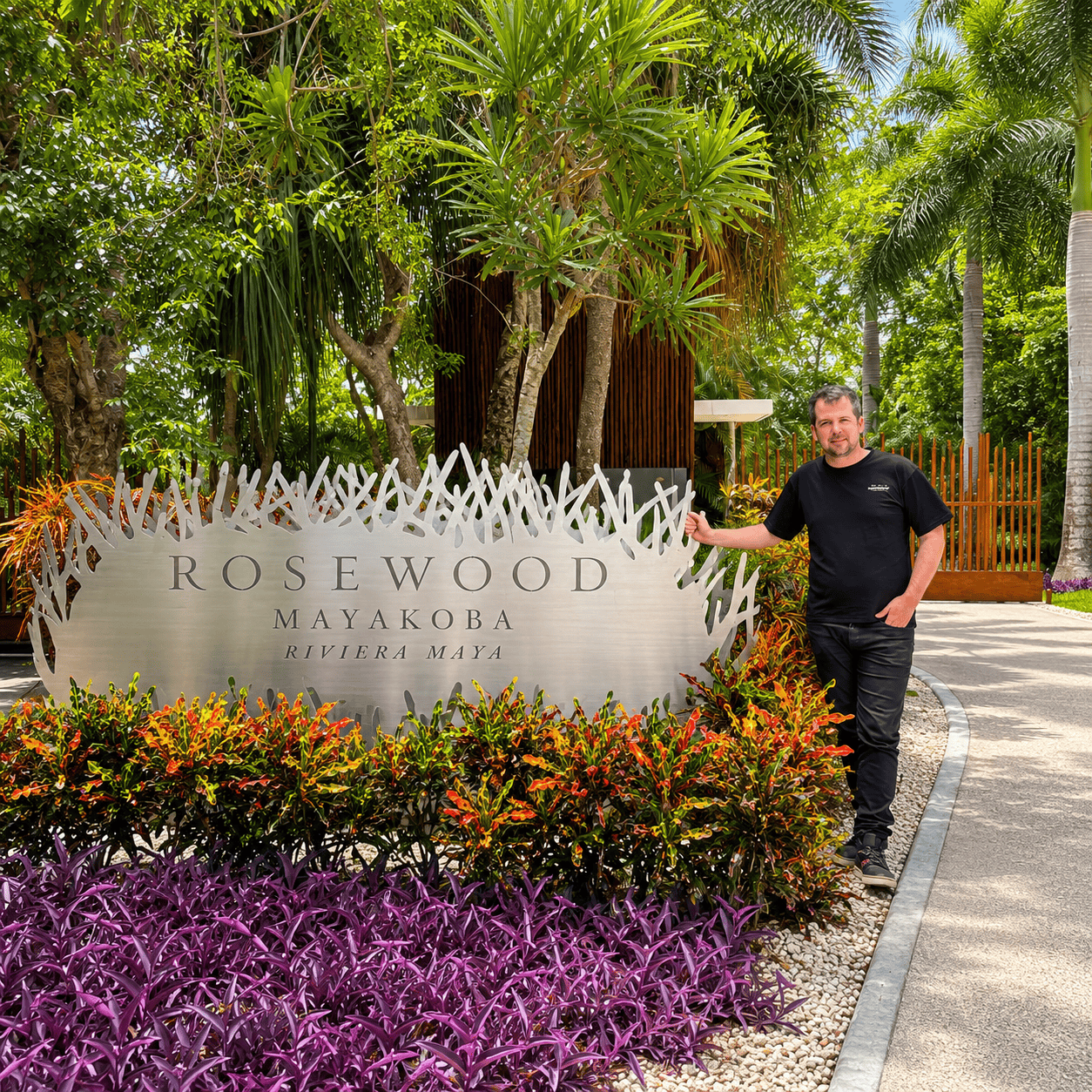 Dylan Clements outside Rosewood Mayakoba in Riviera Maya, a Rosewood Elite property bookable through Clements Travel