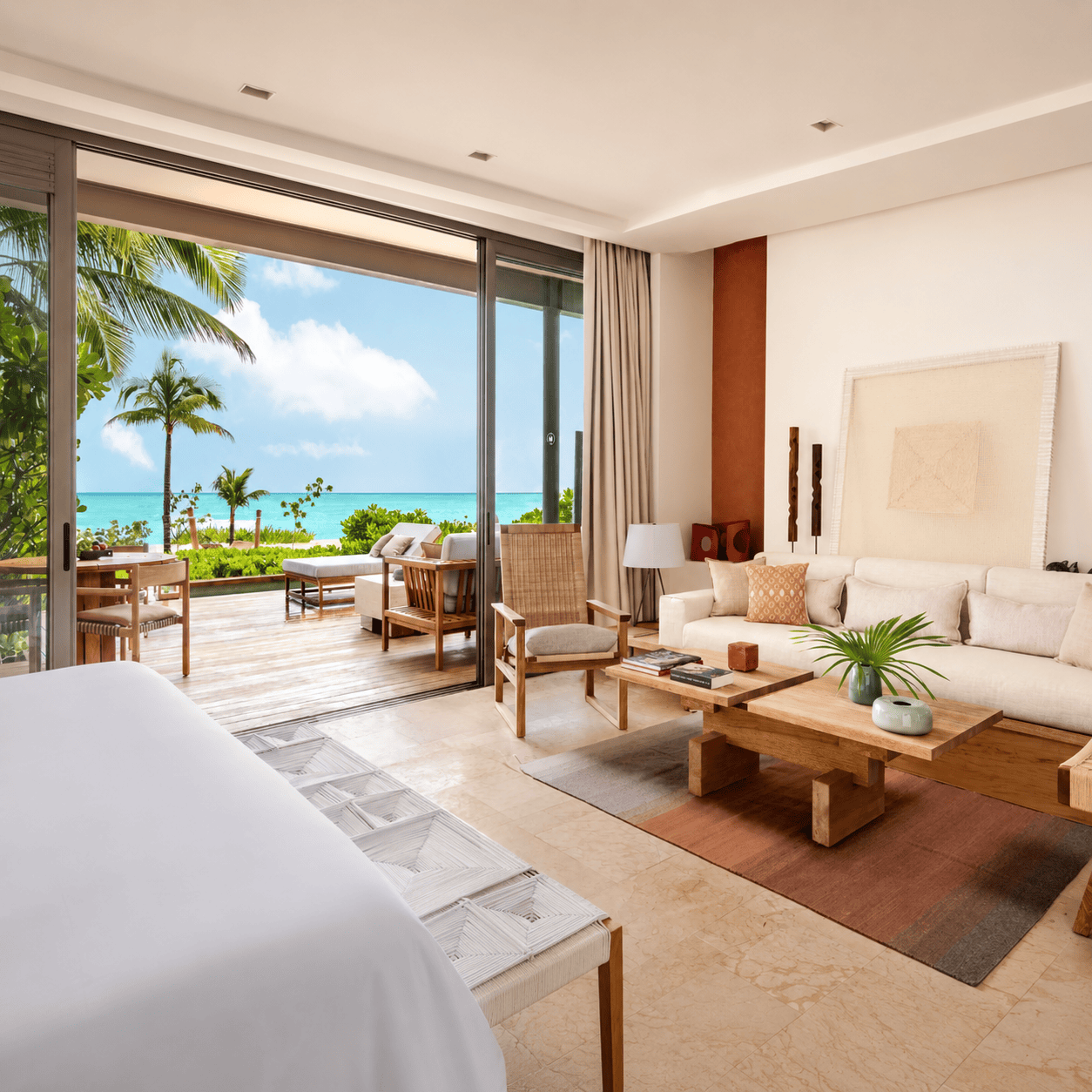 Ocean view suite at a Rosewood resort with Rosewood Elite benefits, terrace and indoor-outdoor living space