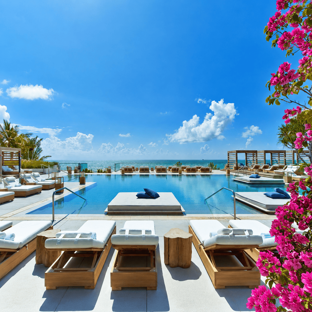 Oceanfront 1 Hotels pool with luxury travel benefits through Clements Travel
