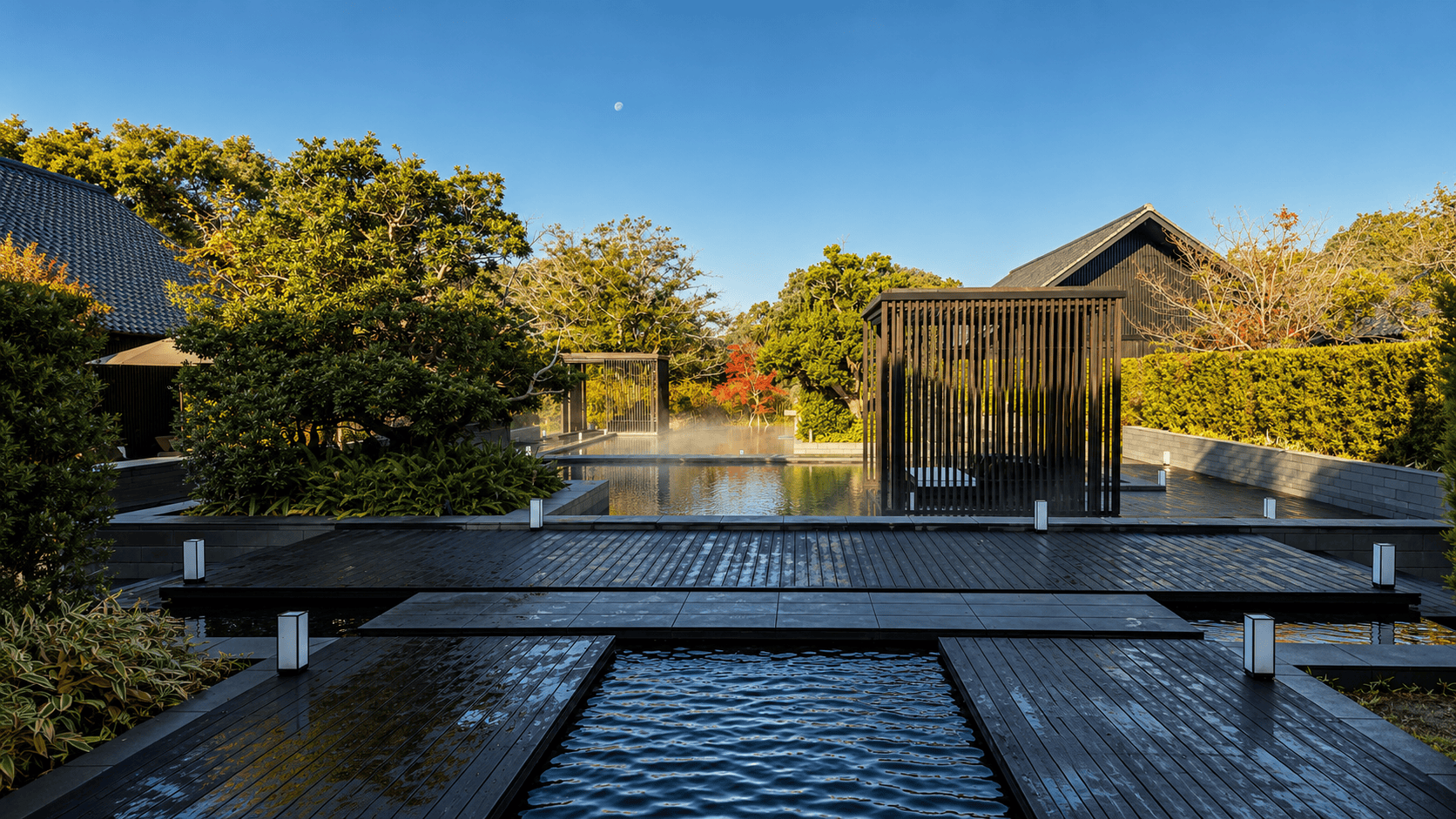 Outdoor thermal pools and Japanese garden at Amanemu in Shima, Japan