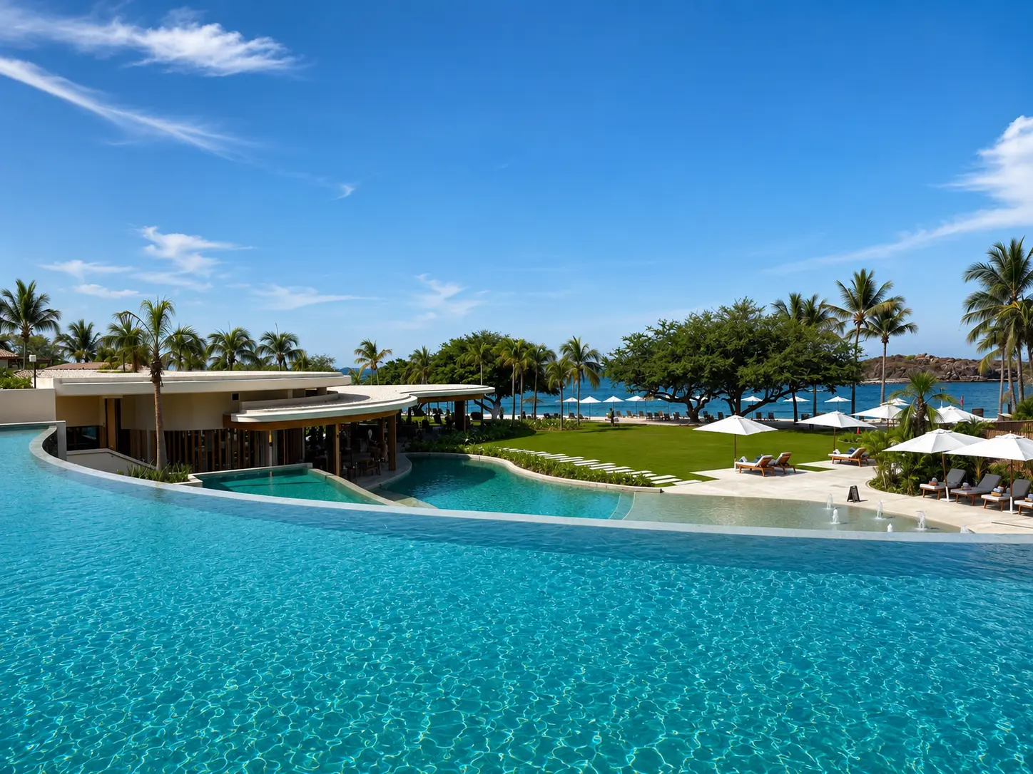 Las Marietas family pool at The St. Regis Punta Mita overlooking the beach and Pacific Ocean.