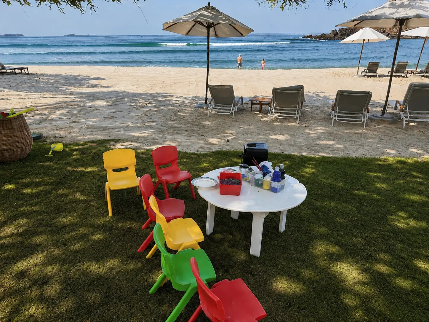 The St. Regis Punta Mita Kids Club sets up arts and crafts activities on the beach for children beneath the shade overlooking the Pacific Ocean.