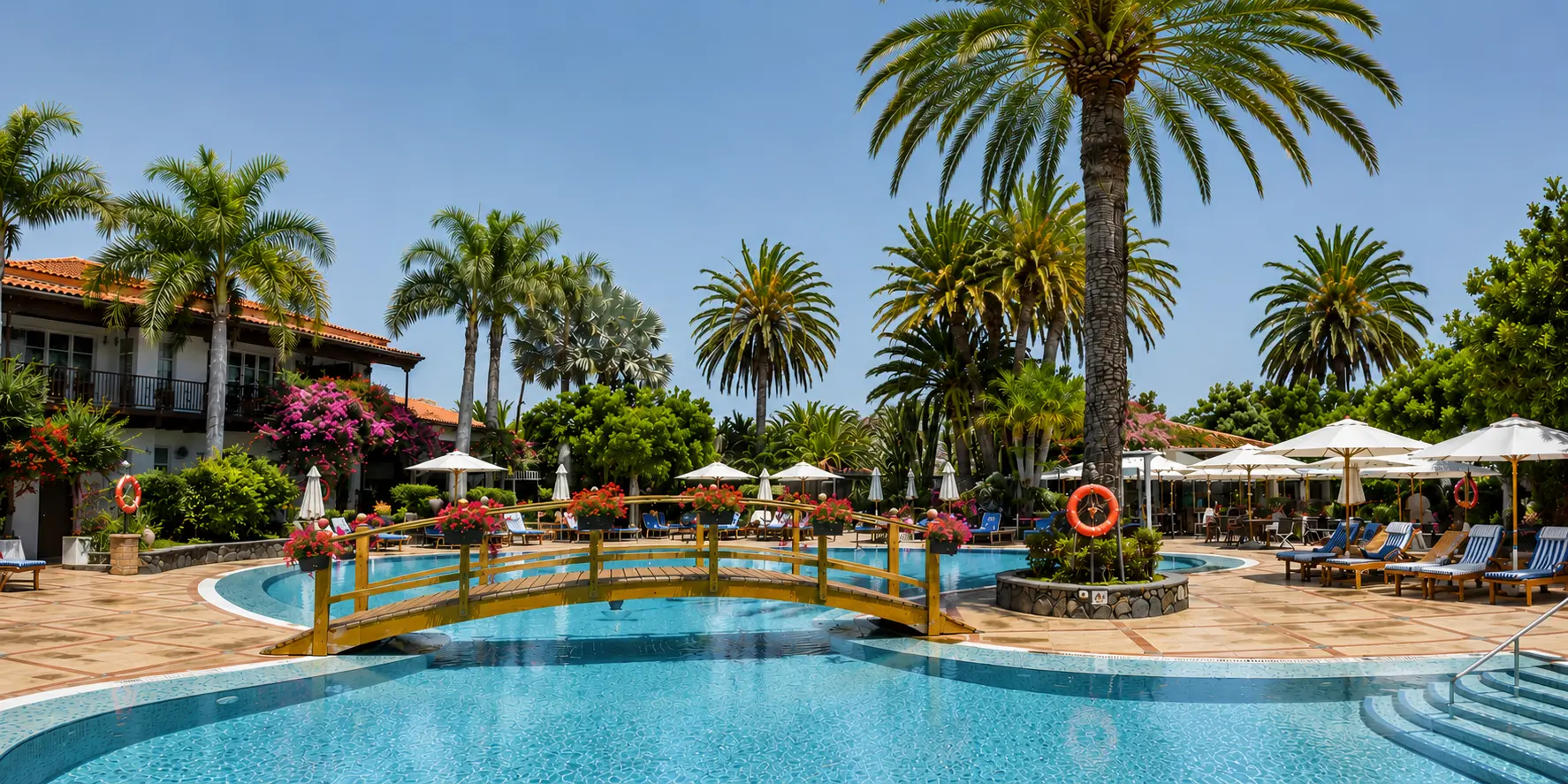 Luxury resort swimming pool at a Leading Hotels of the World property featured in the Stay 3 Pay 2 offer.