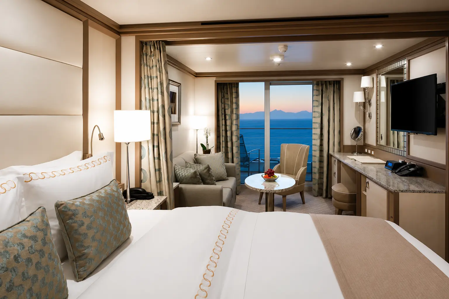 Veranda Suite aboard Silversea Silver Dawn with a private balcony and ocean view.