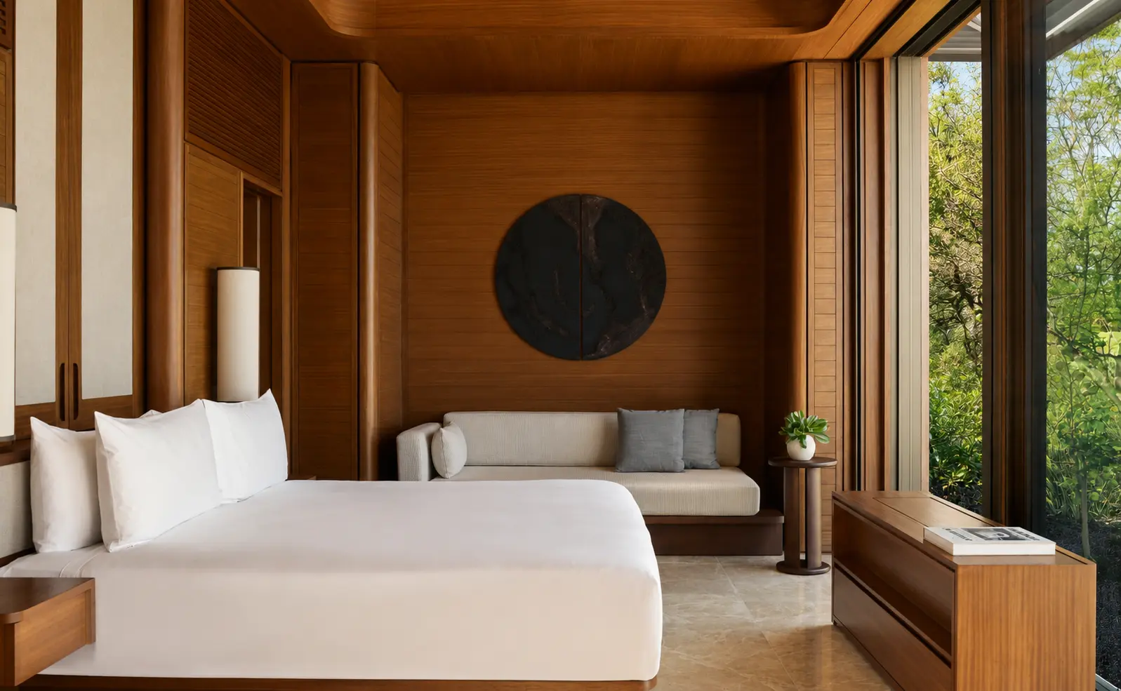 Bedroom inside the Horizon Casita at Amanvari with warm wood interiors and floor-to-ceiling garden views