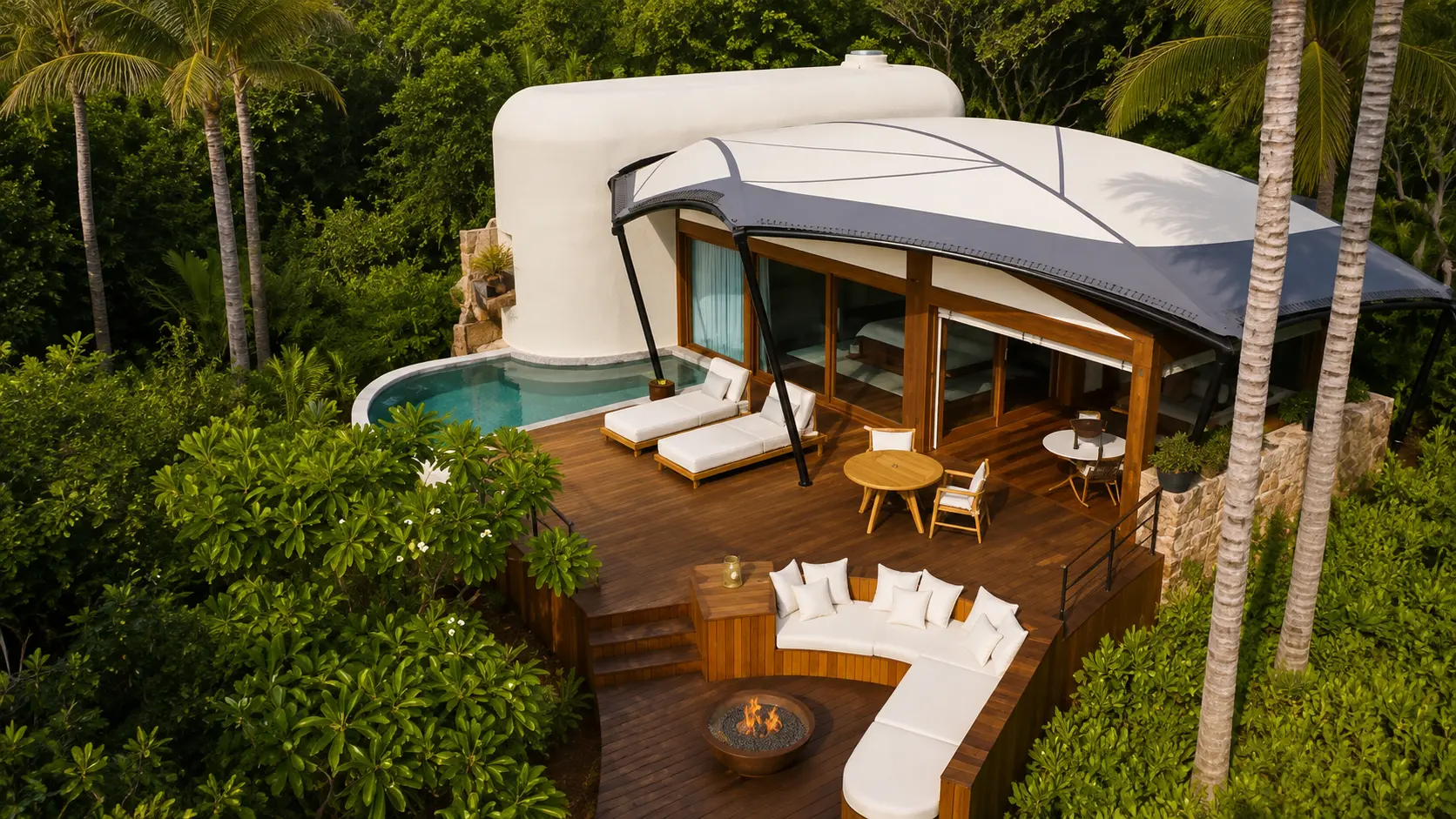 Aerial view of a luxury tented bungalow at Naviva, A Four Seasons Resort, Punta Mita, featuring a private plunge pool, expansive timber deck, outdoor lounge, and tropical jungle surroundings.