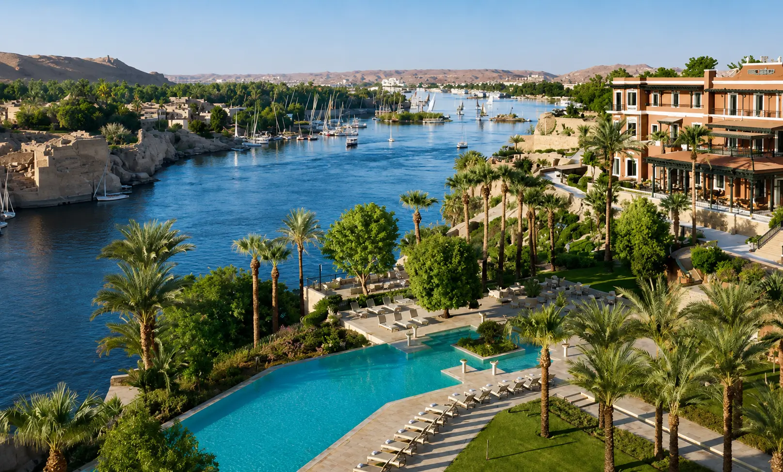 Mandarin Oriental Old Cataract in Aswan overlooking the Nile, swimming pool and palm-filled gardens.