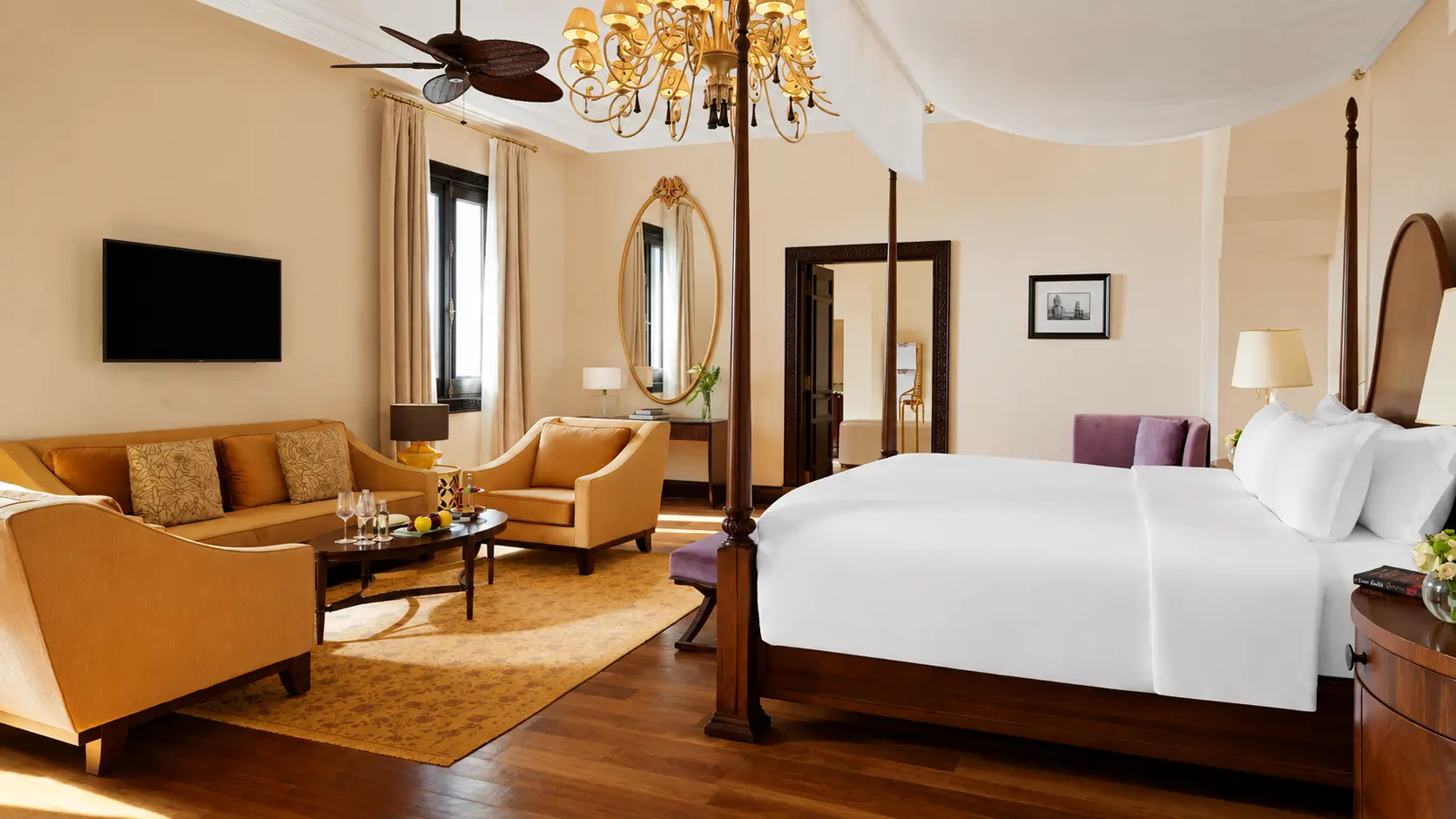 Guest room at Mandarin Oriental Old Cataract in Aswan with a four-poster bed and traditional Egyptian-inspired interiors.