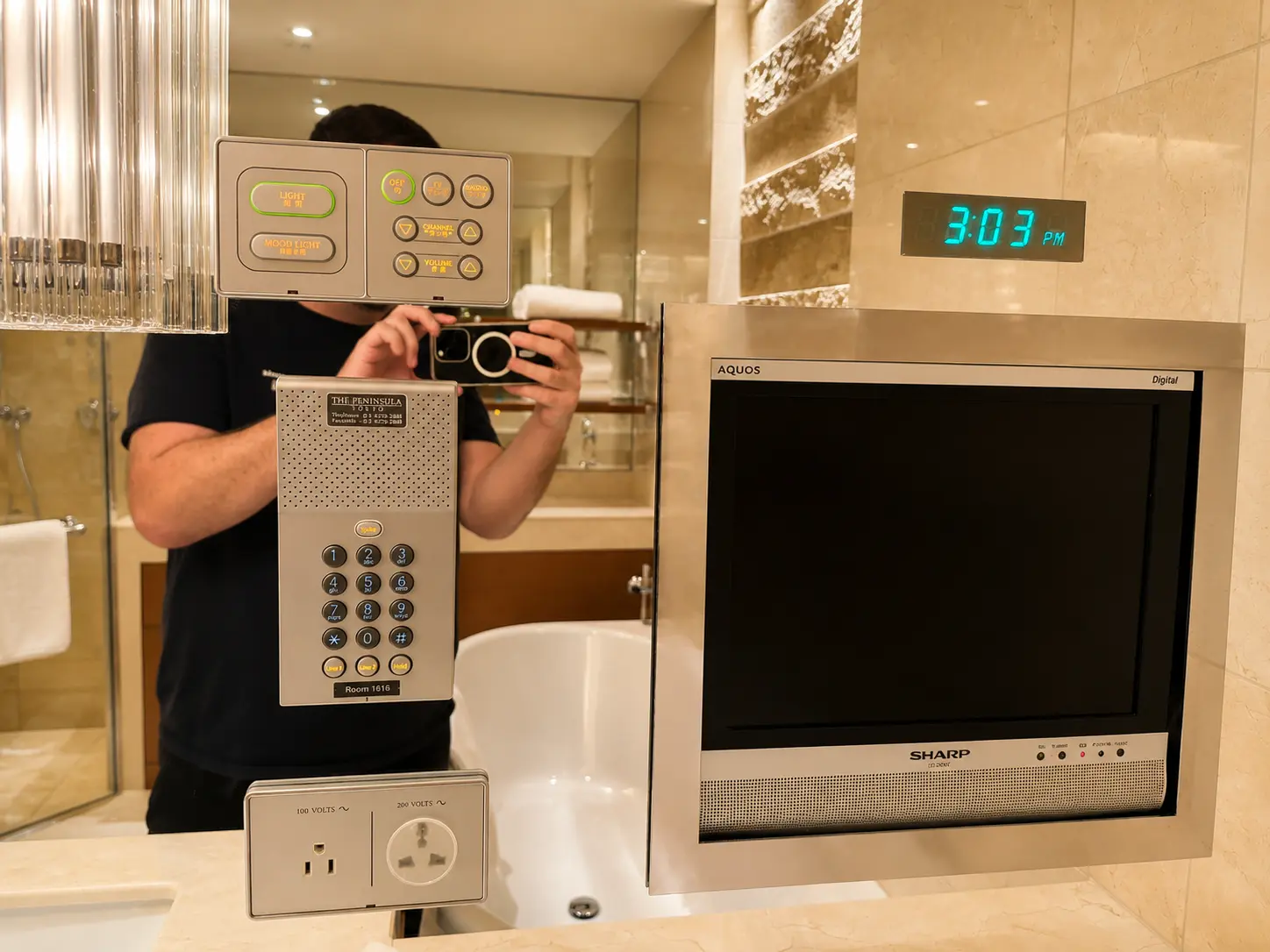 Bathroom television beside the bathtub in a Premier Room at The Peninsula Tokyo
