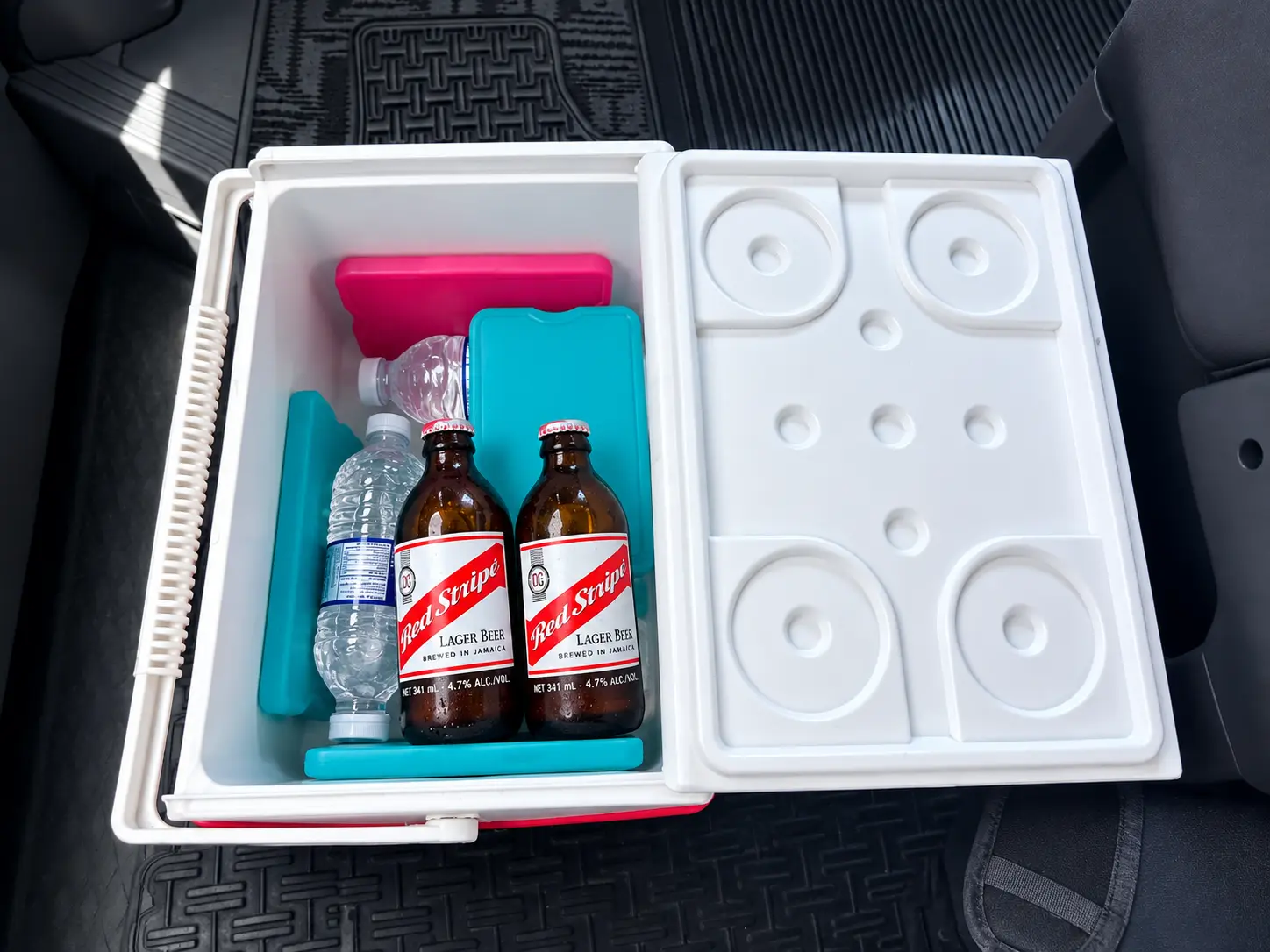 Red Stripe beers and bottled water provided in the transfer to GoldenEye Jamaica.