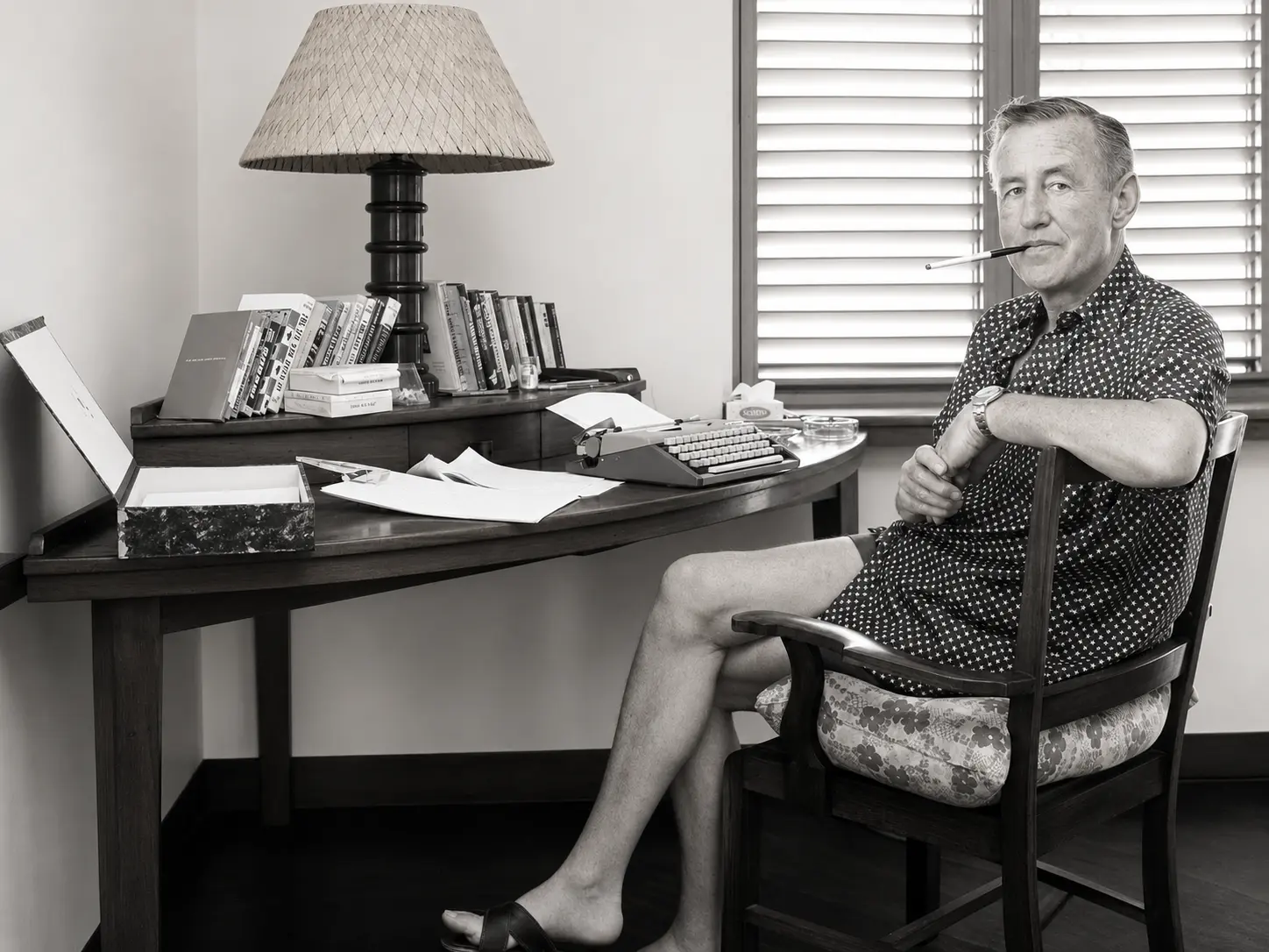 Ian Fleming at his writing desk at GoldenEye in Jamaica, where he wrote the James Bond novels.