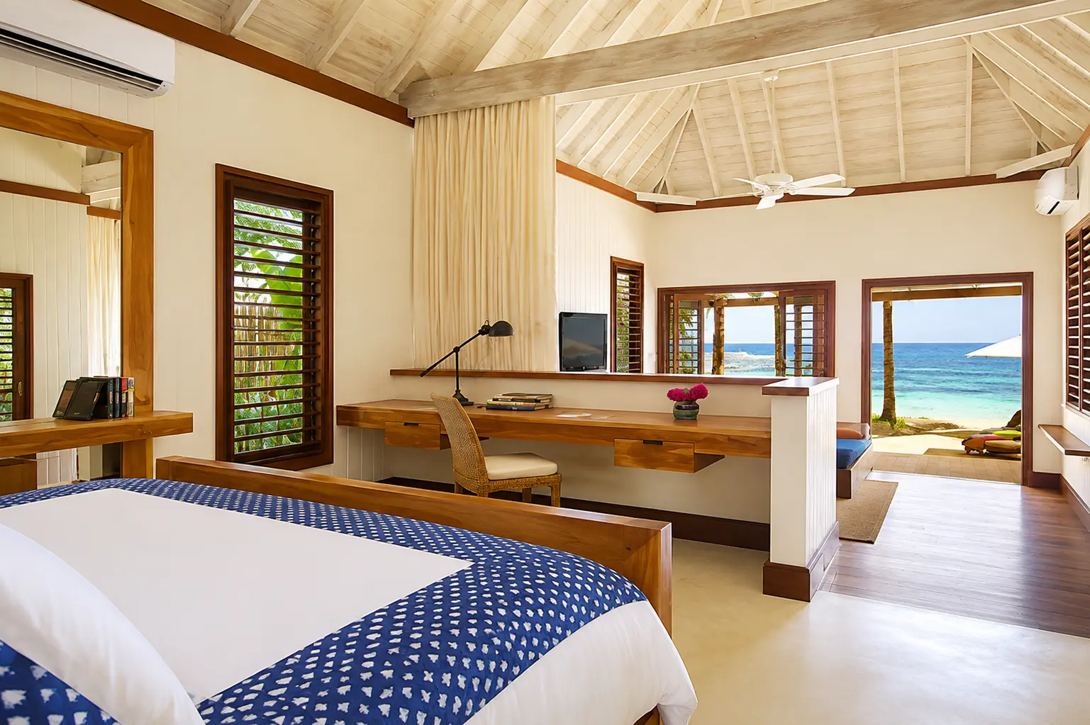 Beach Villa at GoldenEye Jamaica with a private swimming pool, tropical gardens and white Caribbean-style cottages.