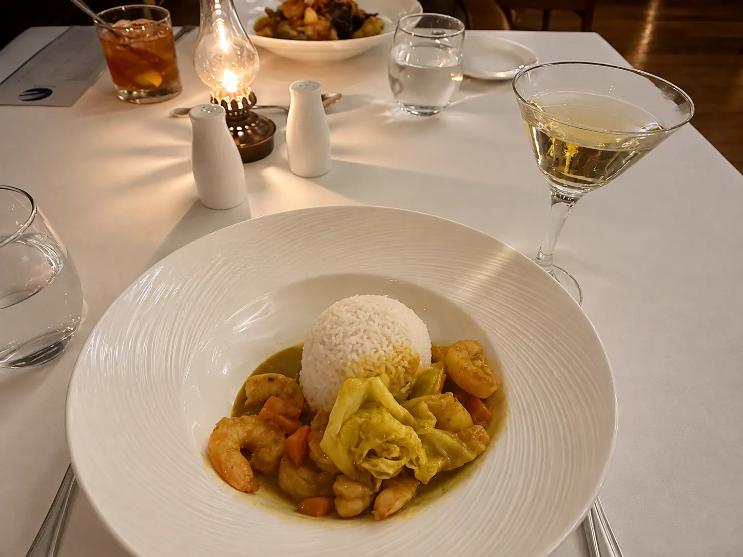 Jamaican dinner at The Gazebo restaurant at GoldenEye Jamaica, with shrimp curry, rice and vegetables.