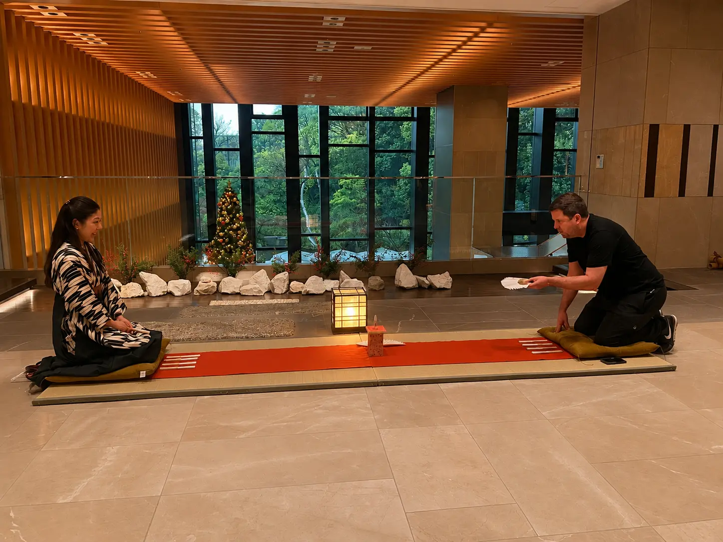 Cultural Ambassador at Four Seasons Hotel Kyoto introducing guests to traditional Japanese games.