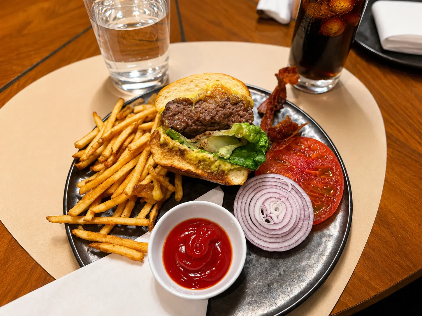 EMBA Signature Wagyu Burger with fries at Four Seasons Hotel Kyoto.