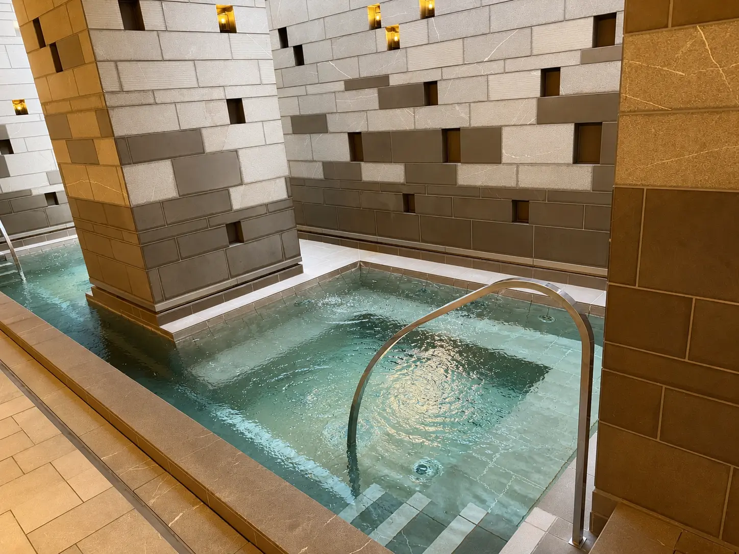 Indoor whirlpool in the spa and pool area at Four Seasons Hotel Kyoto.