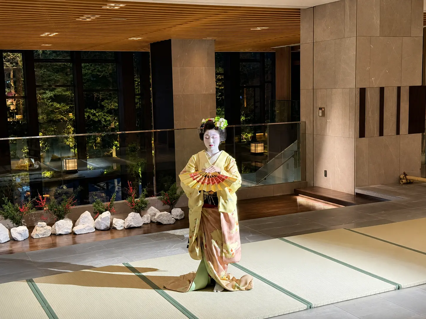 Maiko in traditional kimono during an evening cultural performance at Four Seasons Hotel Kyoto.
