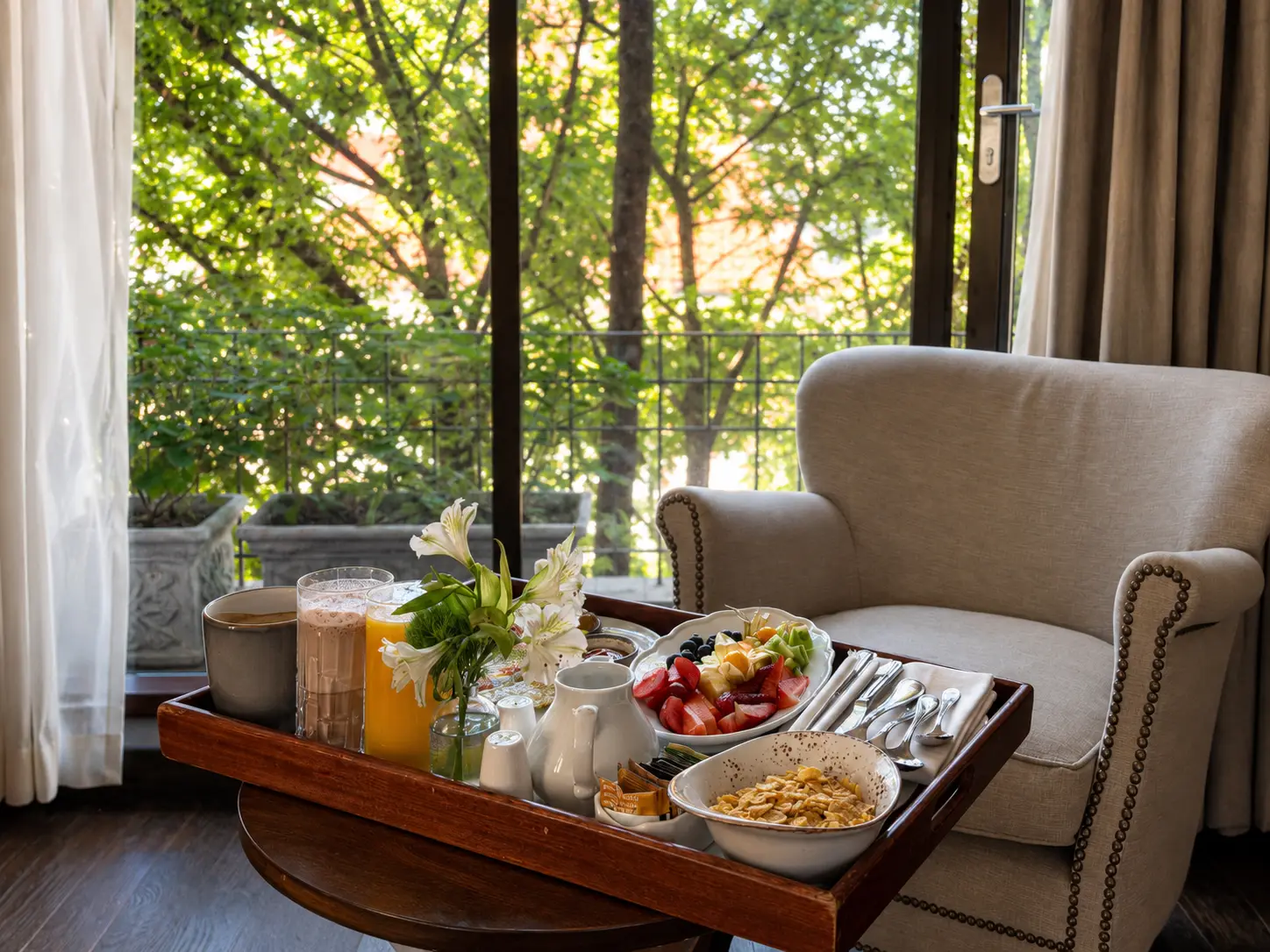 Four Seasons Preferred Partner in-room breakfast at Four Seasons Hotel Casa Medina Bogotá with fresh fruit, cereal, juice and coffee.