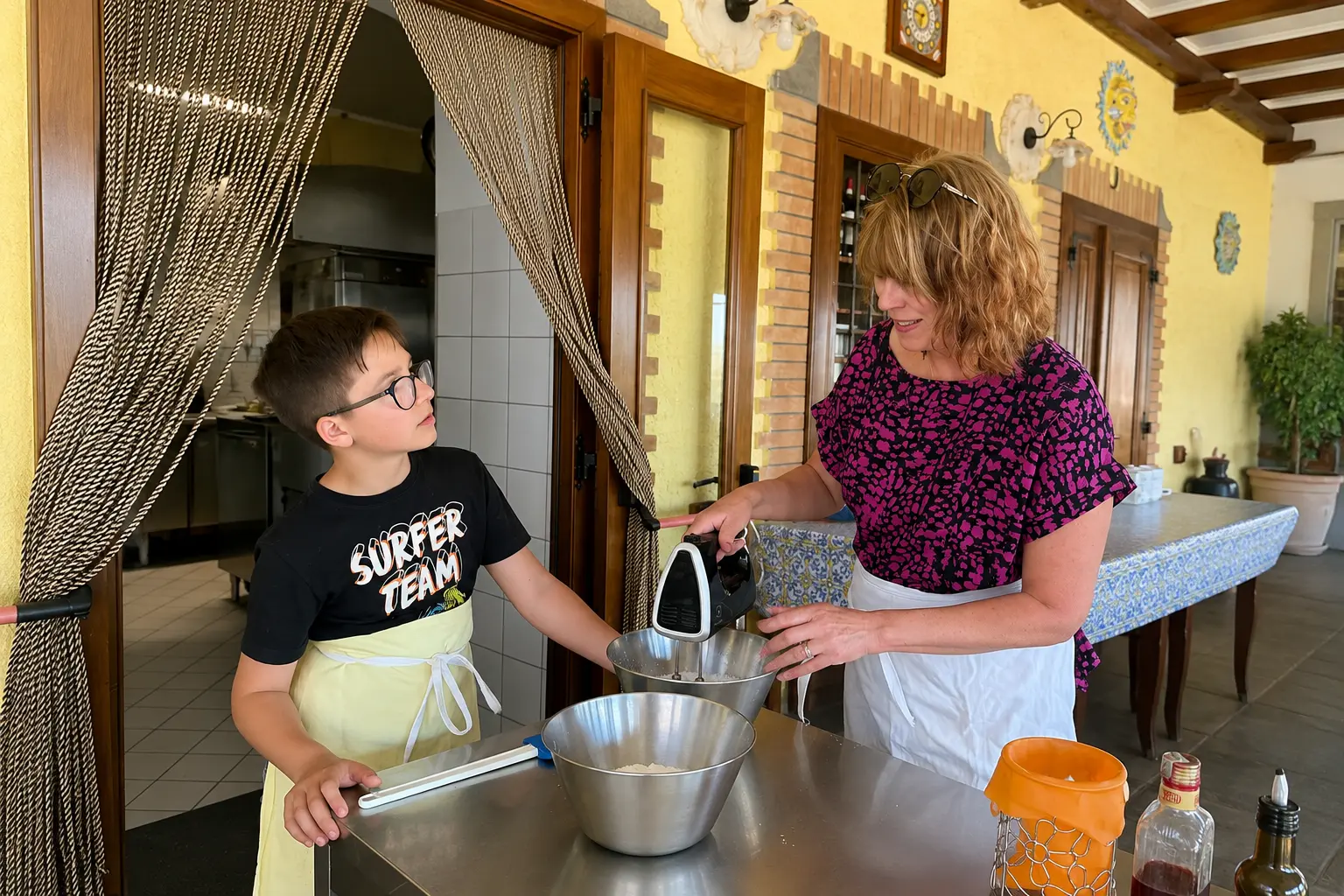 Family taking part in a hands-on cooking class during a luxury Europe trip.
