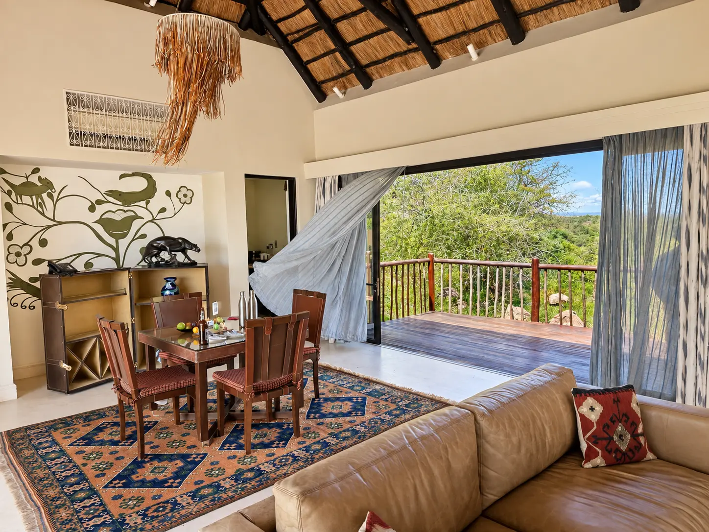 Dining area and private terrace in a One-Bedroom Villa at Four Seasons Safari Lodge Serengeti, Tanzania.