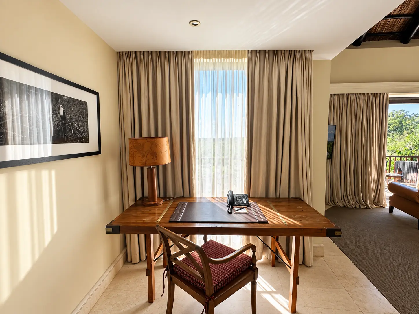 Writing desk and workspace in a One-Bedroom Villa at Four Seasons Safari Lodge Serengeti, Tanzania.