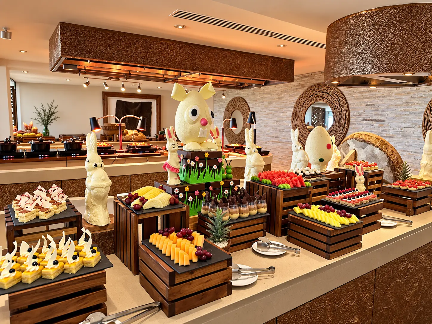 Easter breakfast buffet with pastries, fresh fruit and chocolate displays at Four Seasons Safari Lodge Serengeti.