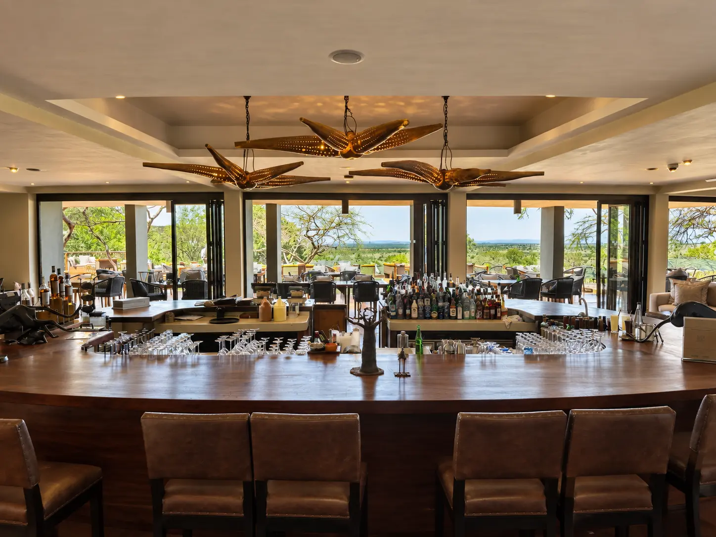 Maji Bar overlooking the Serengeti at Four Seasons Safari Lodge Serengeti.